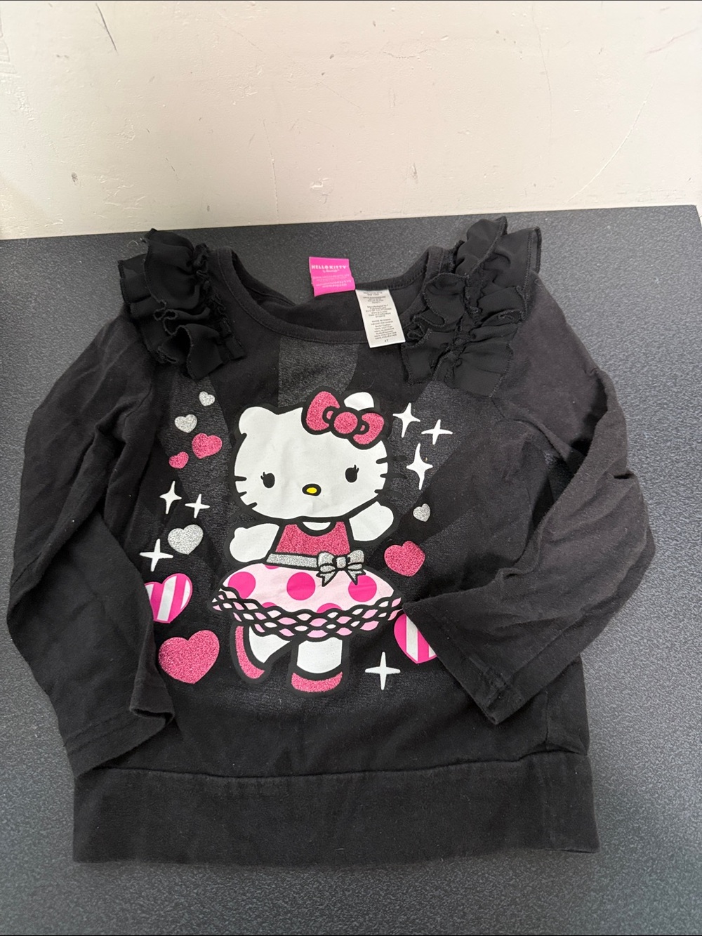 Hello Kitty Black Shirt with Pink & White Glitter Graphic dated 2015